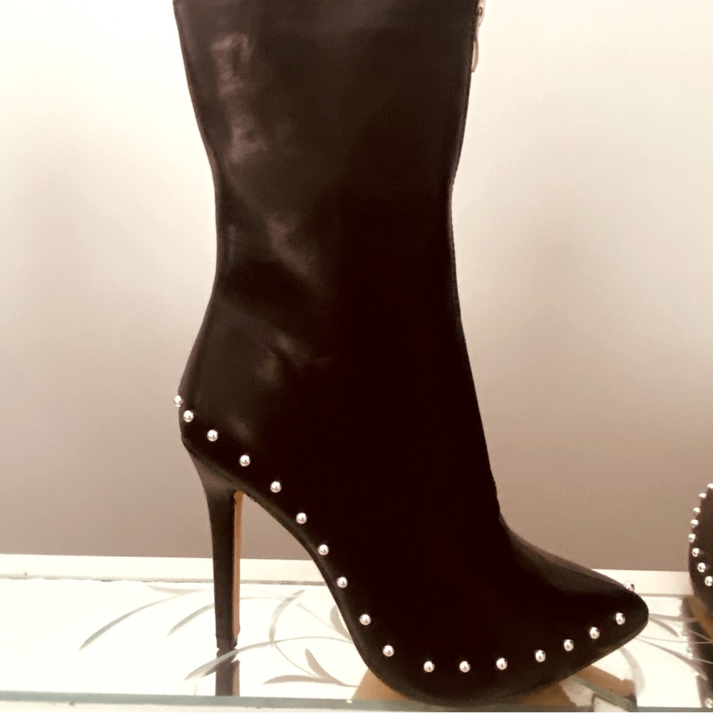 NWT Black pointed toe booty with silver stud edging, stiletto heels
